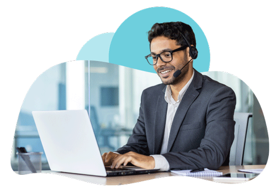 Happy Indian Man Browsing Laptop