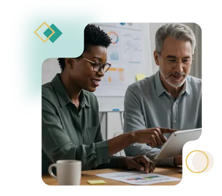 Two DEI leaders in their 40s reviewing inclusive policy data on a tablet during a collaborative session in a modern office