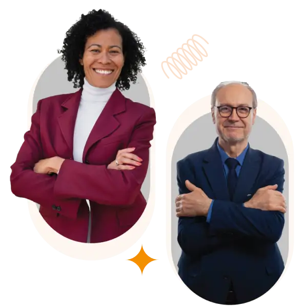  A confident woman in a burgundy suit and a smiling senior man in a blue suit standing with arms crossed, representing diverse business professionals.
