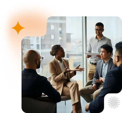  A diverse group of professionals engaging in a productive conversation in a bright office setting.