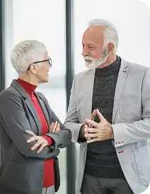 Senior HR executives having a thoughtful peer-to-peer discussion during a regular TEN meeting