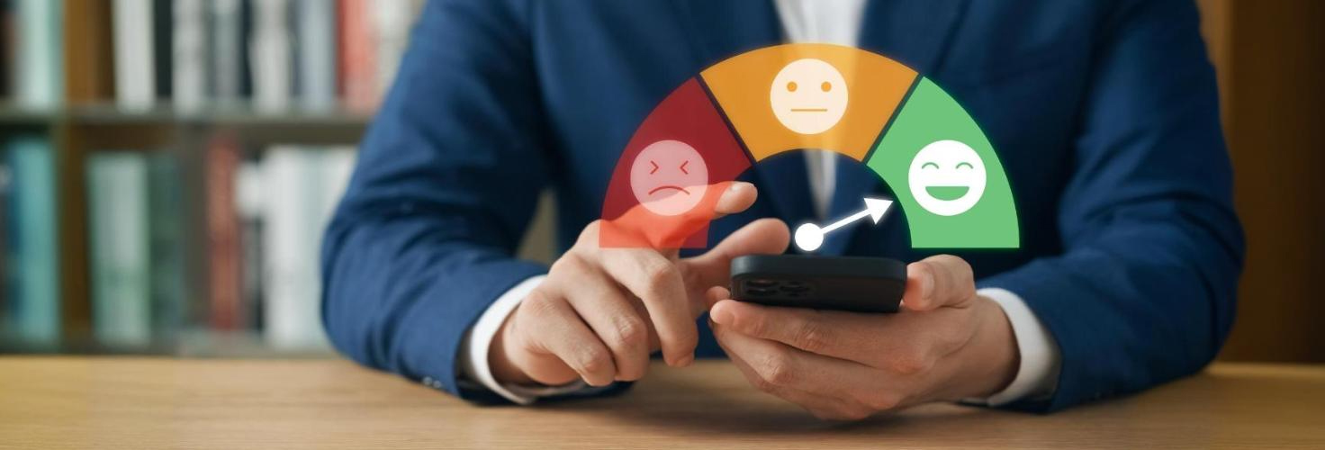a person seen star rating coustomer service on his mobile phone